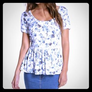 Limited edition beauty and the beast peplum top.